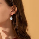 Floating Sparkle Earrings – Suspended Purity